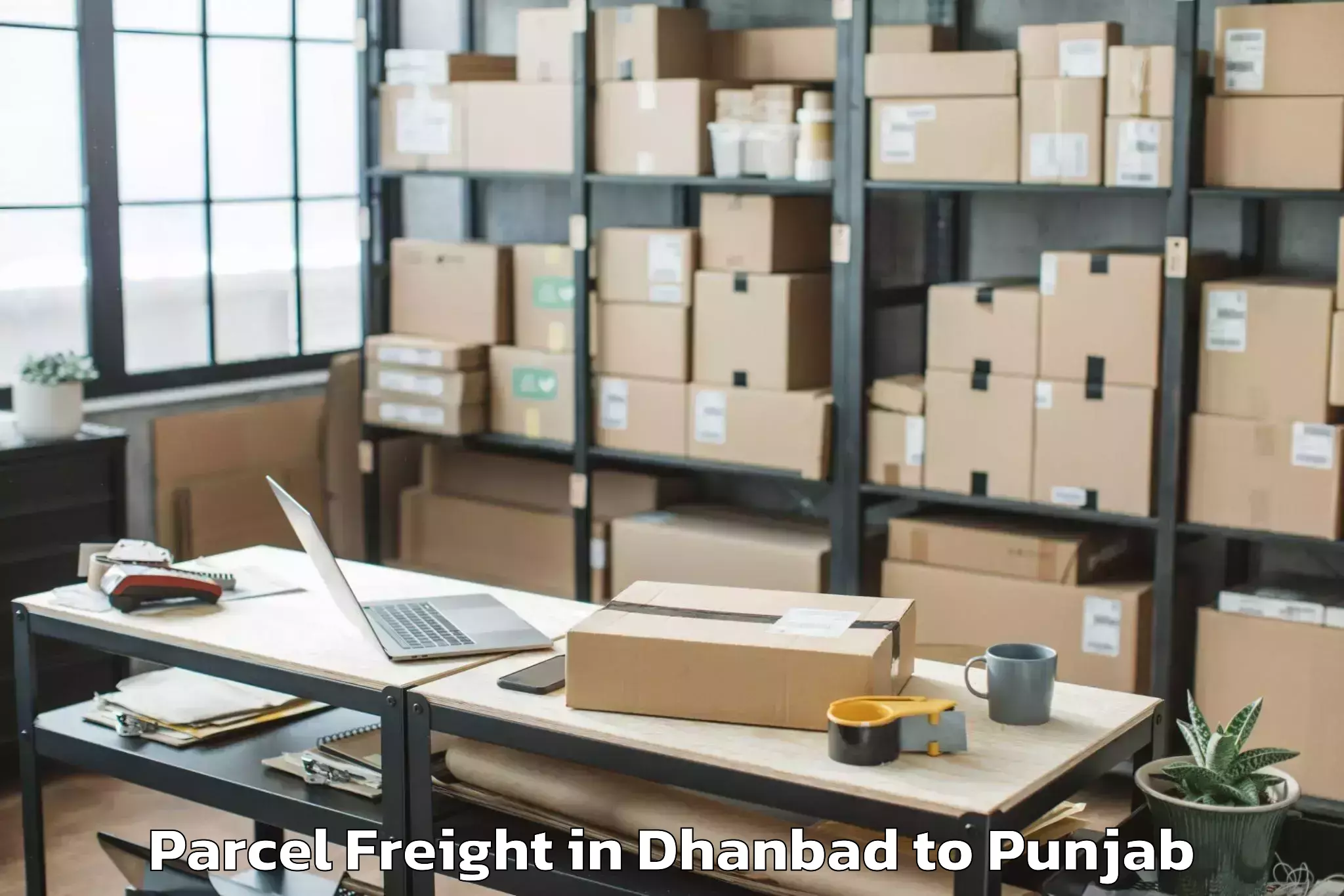 Dhanbad to Jainpur Parcel Freight Booking